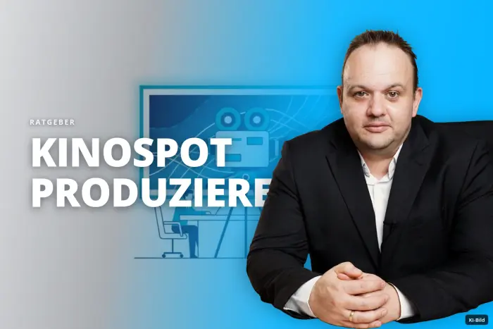 Zwei Männer arbeiten an Laptops vor einem Bildschirm mit einer Filmkamera.
